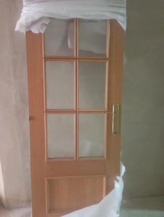 Puerta de roble con cristal biselado