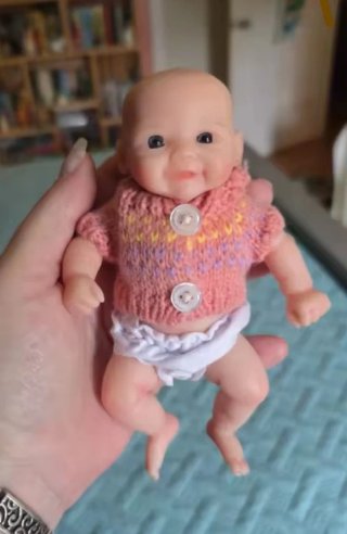 Bebé de silicona 15cm