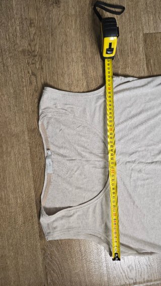 Camiseta OkY sin mangas beige con flecos