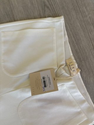 Pantalones blancos acampanados
