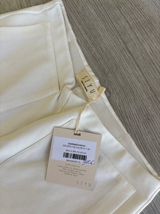 Pantalones blancos acampanados