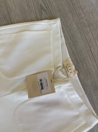 Pantalones blancos acampanados