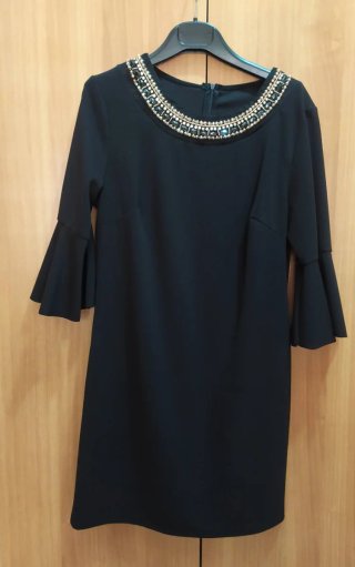 Abito elegante donna con dettagli scintillanti