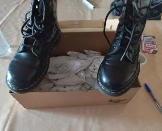 Stivali Dr. Martens neri lucidi
