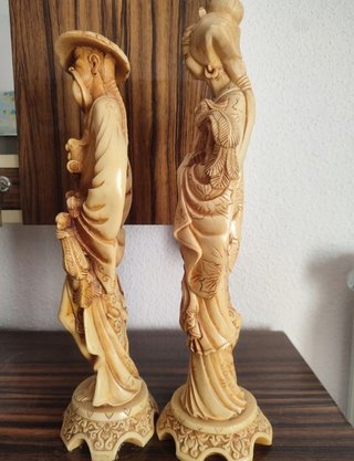 Figuras orientales con dragones