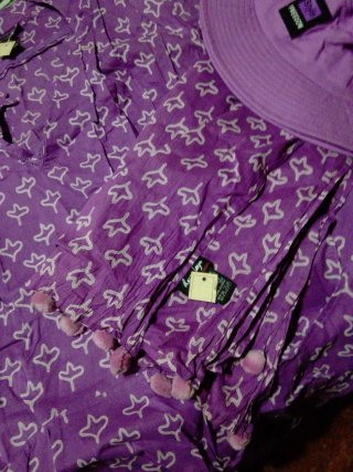 Conjunto playero morado con estampado