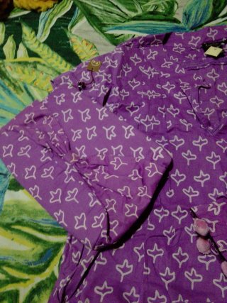 Conjunto playero morado con estampado