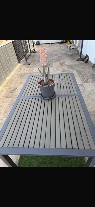 Mesa de terraza con sillas