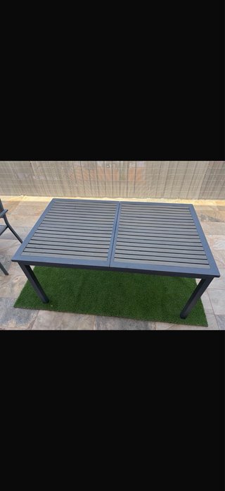 Mesa de terraza con sillas