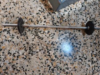 Barra de pesas con discos