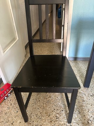 Mesa de comedor negra con 4 sillas