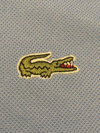 Polo Lacoste Celeste Talla XL (Talla 6)