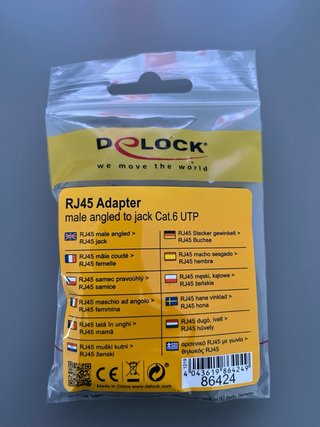 Adaptador RJ45 macho acodado