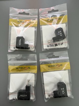 Adaptador RJ45 macho acodado