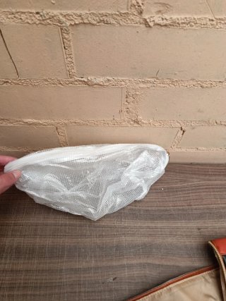 Bolsa de viaje multifunción beige y negra