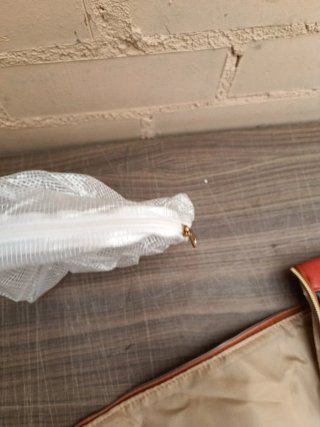 Bolsa de viaje multifunción beige y negra
