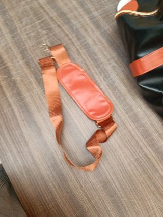 Bolsa de viaje multifunción beige y negra
