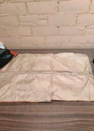Bolsa de viaje multifunción beige y negra