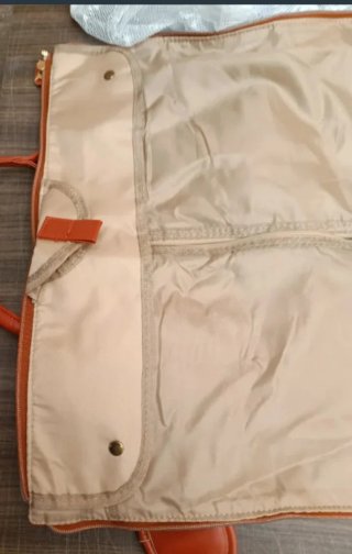 Bolsa de viaje multifunción beige y negra
