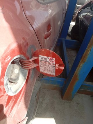 Tapa combustible coche