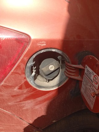 Tapa combustible coche
