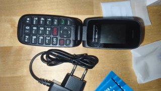 Teléfono móvil UKUU tipo concha negro