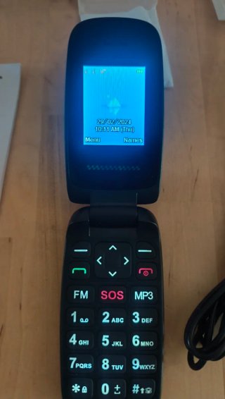 Teléfono móvil UKUU tipo concha negro