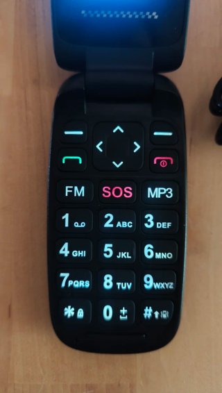 Teléfono móvil UKUU tipo concha negro