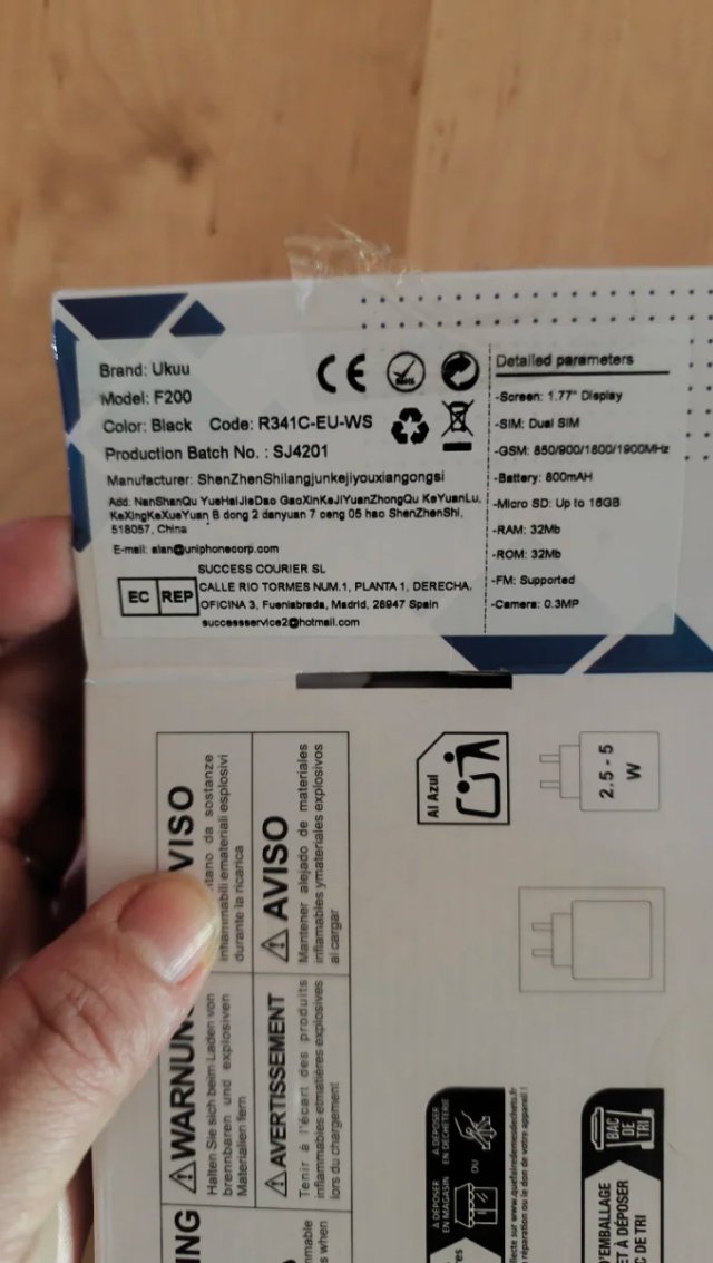 Teléfono móvil UKUU tipo concha negro