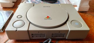 Playstation 1 con scatola completa e lettore nuovo