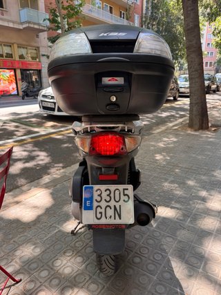 Honda SH 125 Scooter verde oscuro