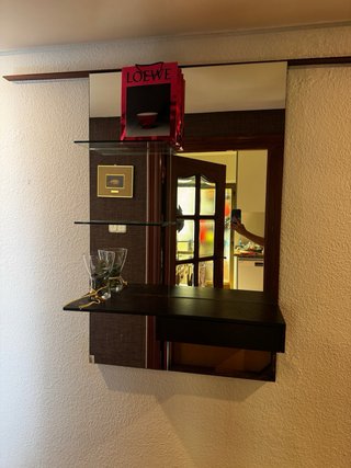 Mueble recibidor negro y madera