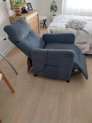 Sillón reclinable con mando gris