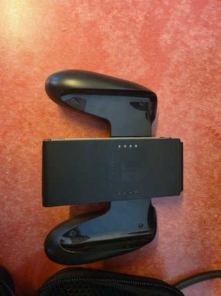Nintendo Switch V2 + funda + cargador