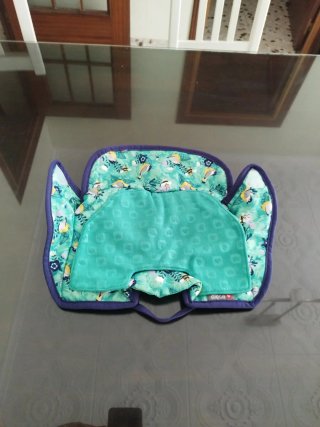 Dos protector silla bebé impermeable marca close