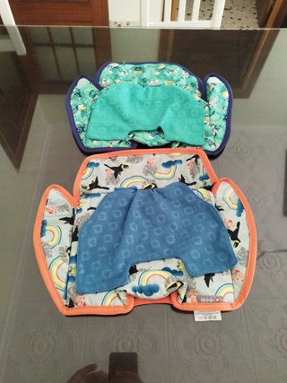 Dos protector silla bebé impermeable marca close
