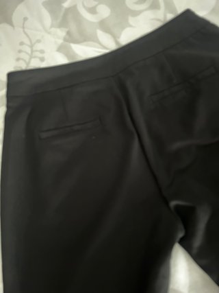 Pantaloni eleganti neri con dettaglio catena T. M