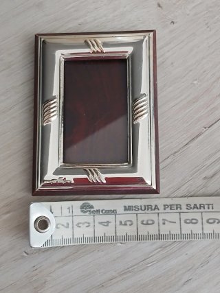Cornice in argento
