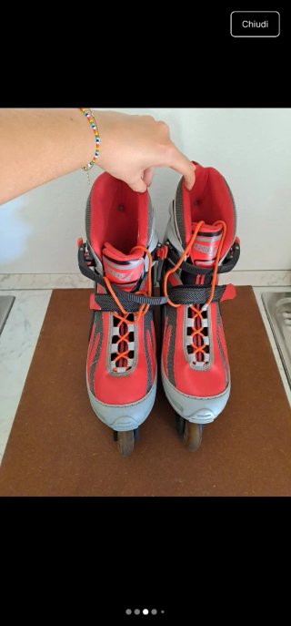 Pattini in linea grigi e rossi, taglia 43-44