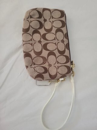 Pochette Coach monogramma marrone e bianca