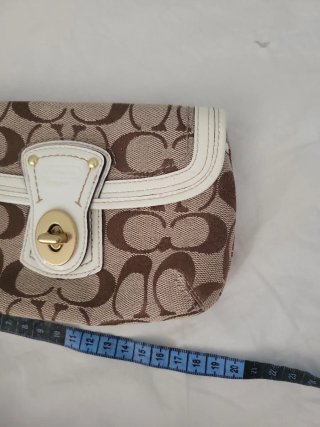 Pochette Coach monogramma marrone e bianca
