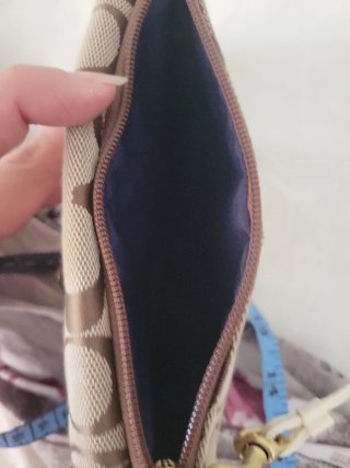 Pochette Coach monogramma marrone e bianca