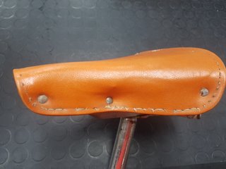 Sella bici vintage arancione in pelle