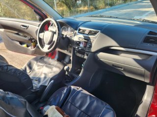 Suzuki Swift Rojo