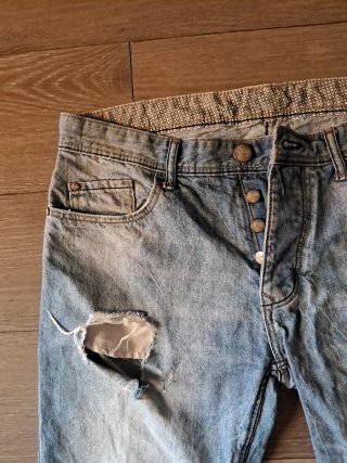 Pantalones cortos vaqueros rotos