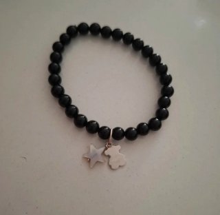 Pulsera Tous Negra con Oso y Estrella