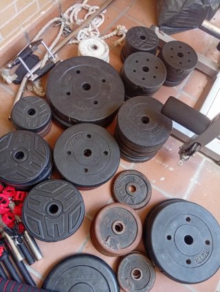 Máquina de pesas y discos gym