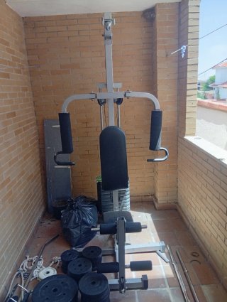 Máquina de pesas y discos gym