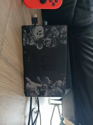Nintendo Switch con mando y adaptador