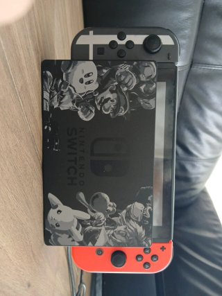 Nintendo Switch con mando y adaptador